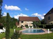 Piscine chauffée des cottages de charme 5 étoiles du Domaine de Louveraude en Nouvelle Aquitaine