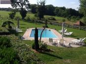 Piscine chauffée des cottages de charme 5 étoiles du Domaine de Louveraude en Nouvelle Aquitaine